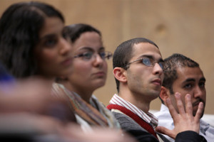 a group of students listening in lecture academics