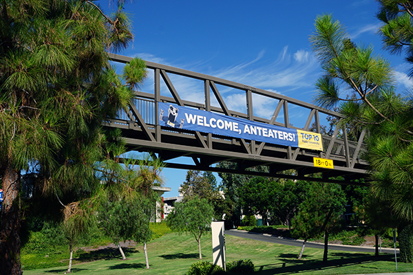 A welcome banner on a bridge