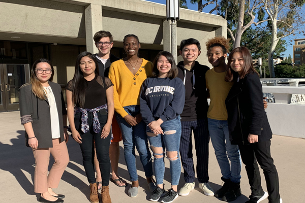 uci students smiling for committee photo